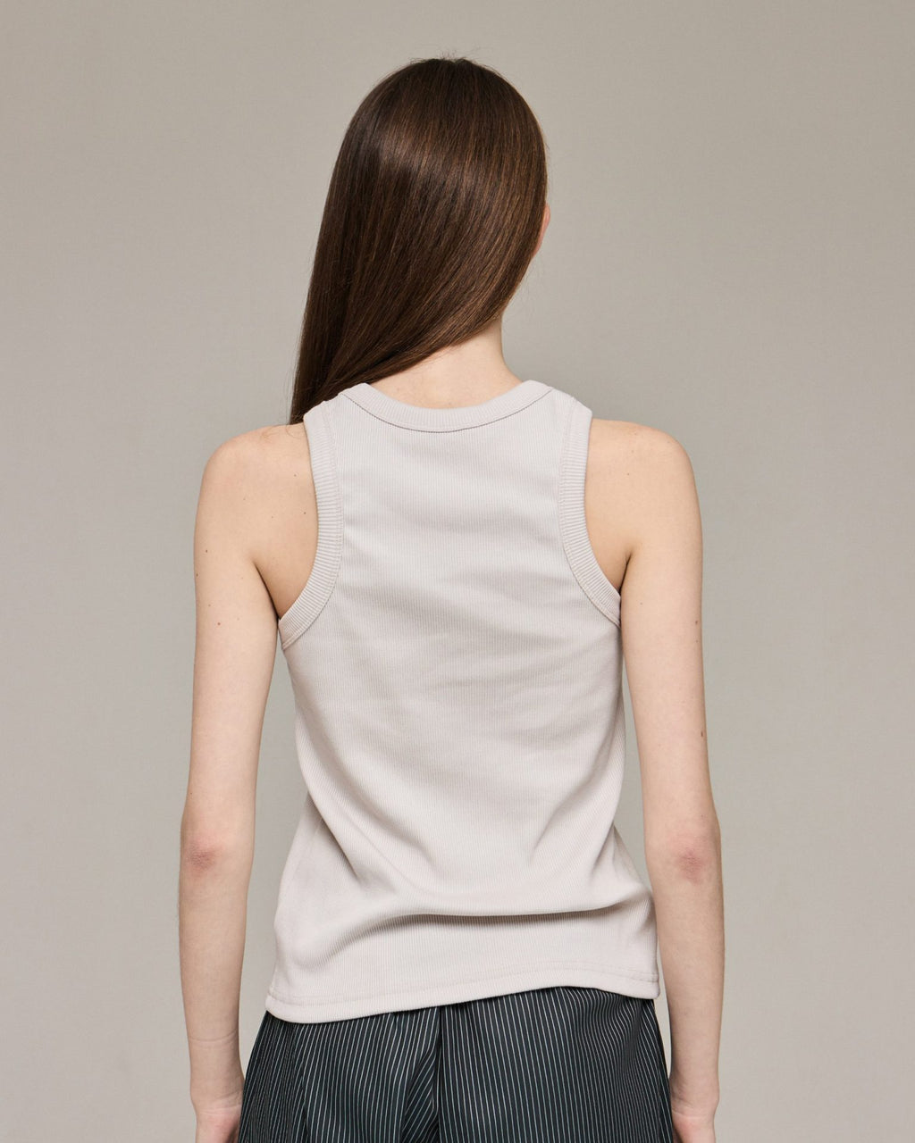 Жіночий топ молочного кольору в рубчик від ANMIREPOSE