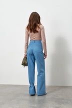 Лонгслів з драпіруванням і золотою деталлю від KA.EL