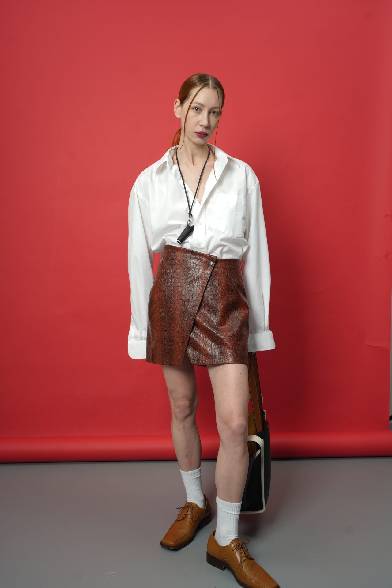 Спідниця синтетична шкіра коричнева BRU